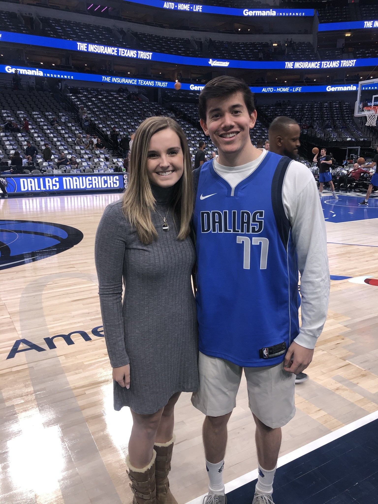Aidan and his wife and a Dallas Mavericks game